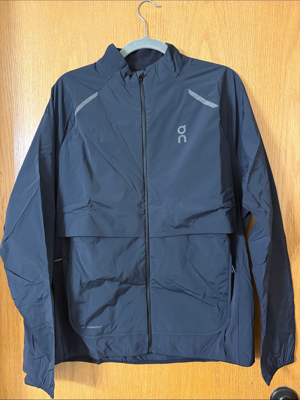 On Running Men's Black Insulated Running Jacket with Reflective Accents